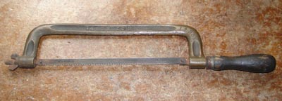 Solid Brass Intercolonial Railway Hacksaw with ICR initials.